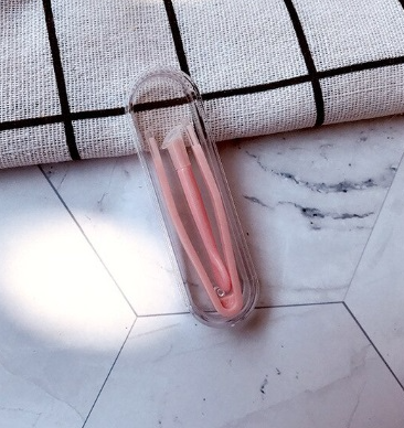 Pinzas y aplicador rosa