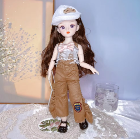 Muñeca Brown articulada de 30 cm (muñeca,ropa y zapatos)